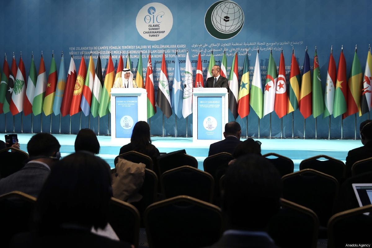 Turkish Foreign Minister Mevlut Cavusoglu (R) and OIC Secretary-General Yousef bin Ahmad Al-Othaimeen (L) hold a joint press conference after "Organization of Islamic Cooperation (OIC) Emergency Open-Ended Executive Committee Meeting at the Level of Foreign Ministers on the Terrorist Attack Against Two Mosques in New Zealand and on Countering Hatred and Intolerance against Muslims" in Istanbul, Turkey on 22 March 2019. [Fatih Aktaş - Anadolu Agency]