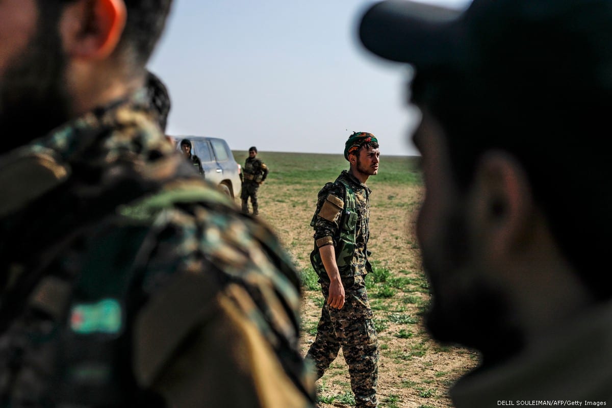 Fighters with the Syrian Democratic Forces (SDF) in Syria on 25 February 2019 [DELIL SOULEIMAN/AFP/Getty Images]