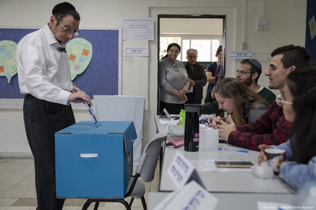 A man casts his vote during the Israeli general elections in Tel Aviv on 9 April 2019 [Faiz Abu Rmeleh/Anadolu Agency]
