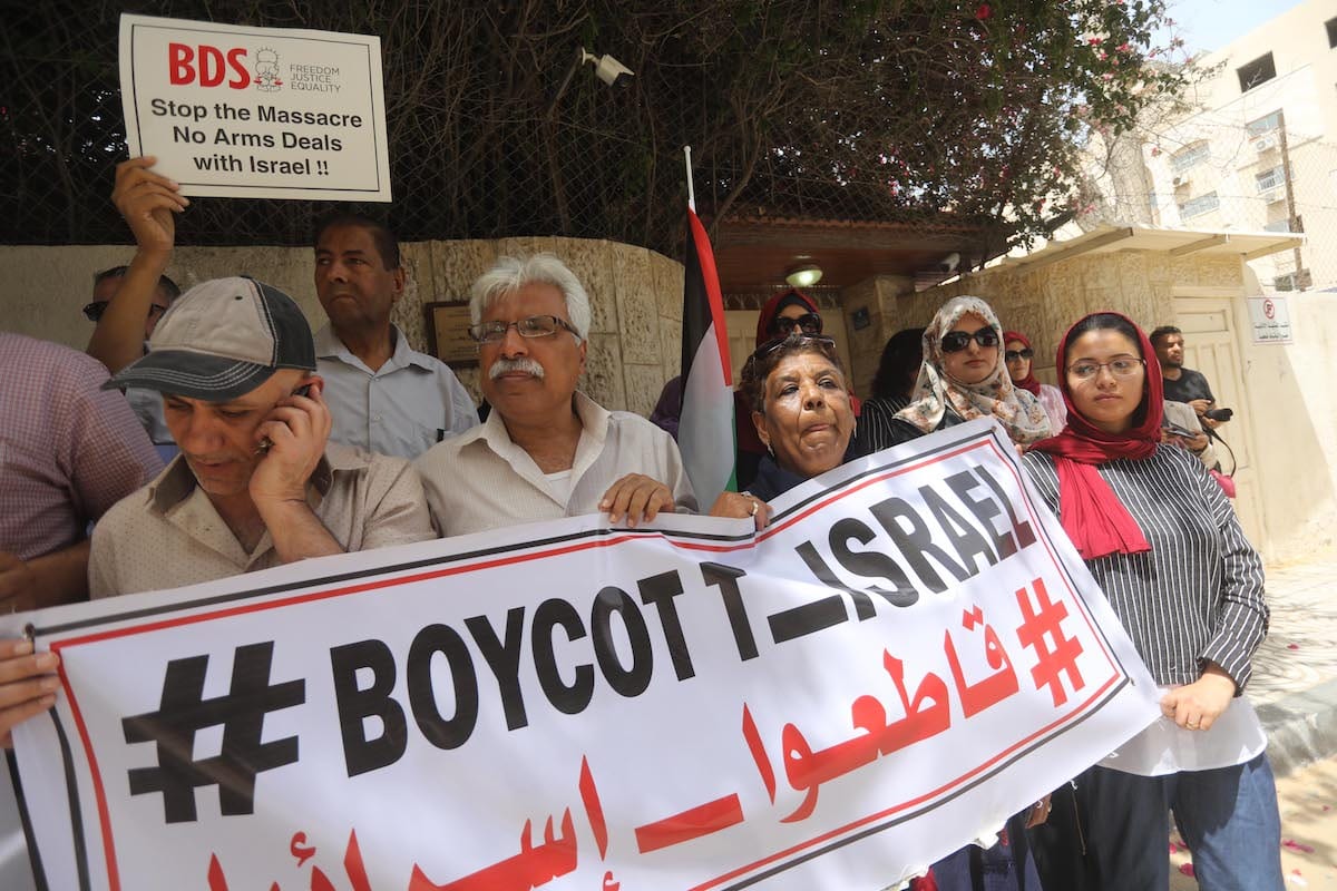 Palestinians in Gaza protest against German Parliament decision on BDS, in Gaza on 23 May 2019 [Mohammed Asad/Middle East Monitor]