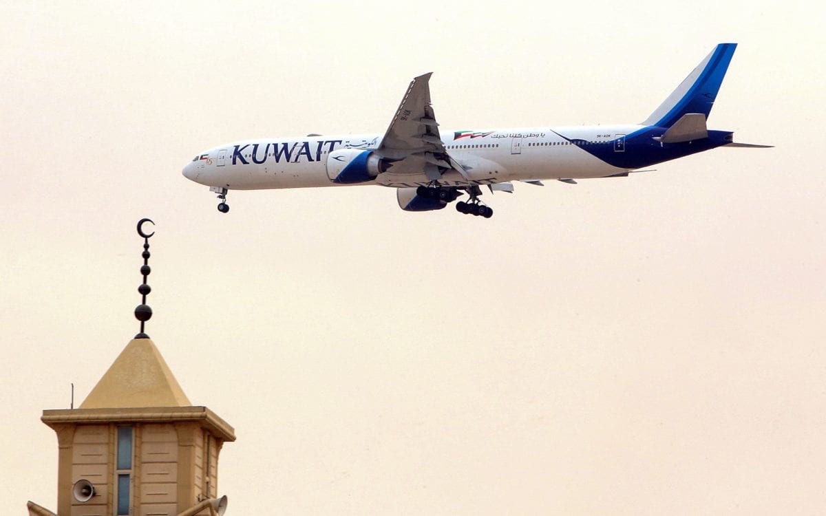 A Kuwait Airways Boeing B777 aircraft prepares to land at Kuwait International Airport in Kuwait City on 13 March 2019 [Yasser Al-Zayyat/AFP/ Getty]