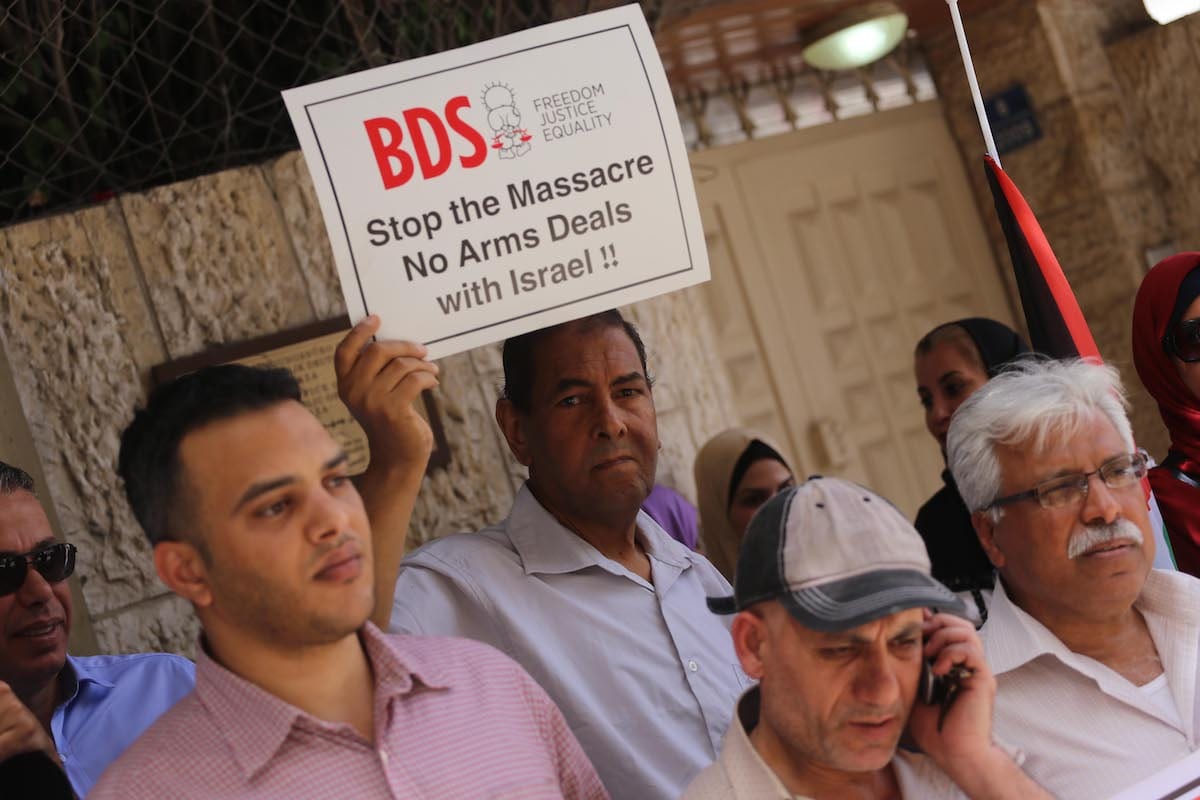 Palestinians in Gaza protest against German Parliament decision on BDS, in Gaza on 23 May 2019 [Mohammed Asad/Middle East Monitor]