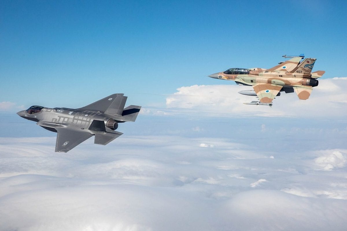 The Israeli Air Force's latest fighter jet - the F-35 [left] seen in flight along with an older F-16, on December 13, 2016 [Israeli Air Force / WikiMedia]