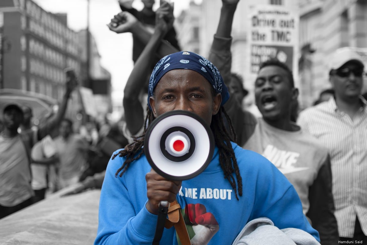 Protesters in London march on the 30th anniversary of when Ousted Sudan President, Omar Al-Bashir came into power through the coup [Hamduni Said]