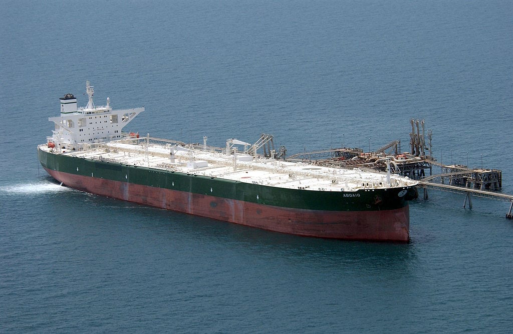 Commercial oil tanker AbQaiq readies itself to receive oil at Mina-Al-Bkar Oil terminal (MABOT), an off shore Iraqi oil installation [US Navy-Wikipedia]