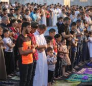 Muslims gather to perform the Eid Al-Adha (Feast of the Sacrifice) prayer at the site of the "Great March of Return" demonstrations were held in Gaza City, Gaza on 11 August 2019. [Mohammed Asad - Middle East Monitor]