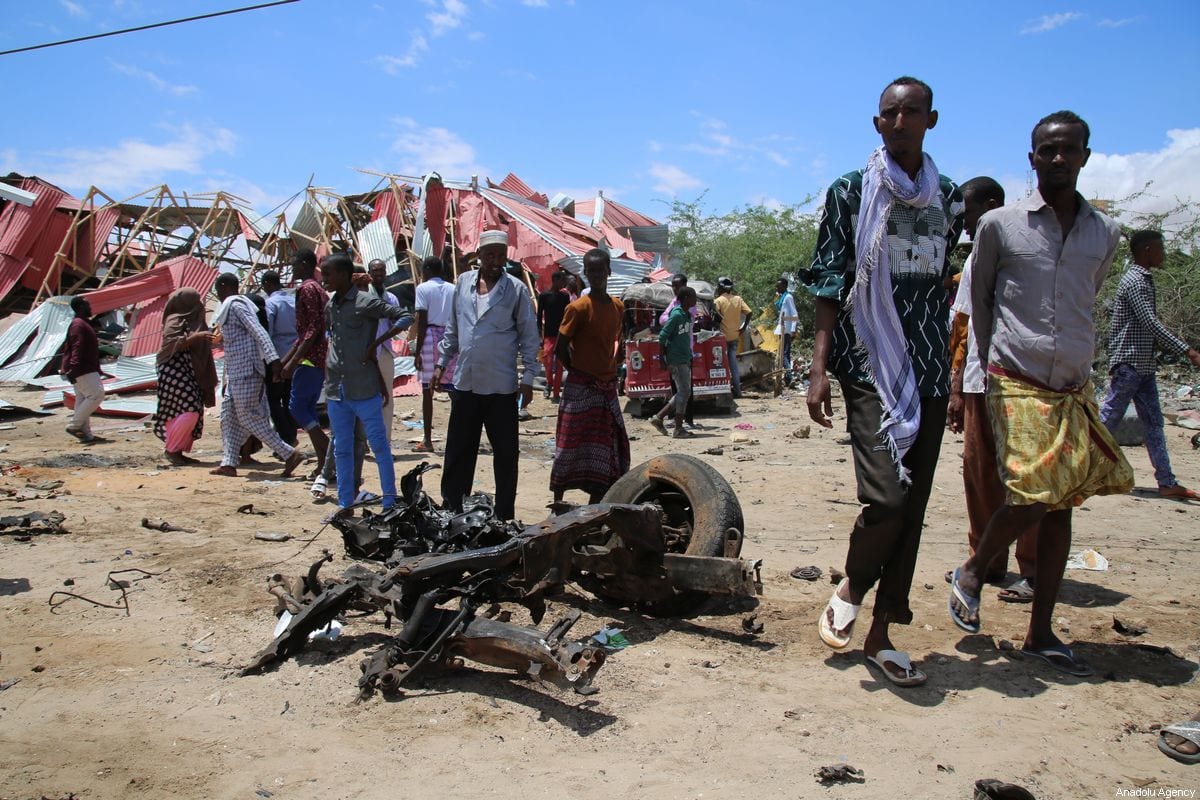 A wrecked vehicle part lies on the ground after Al-Shabaab militants set of bombs in Mogadishu, Somalia on 30 September 2019 [Sadak Mohamed/Anadolu Agency]