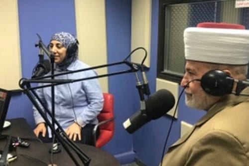 Dr Samah Jabr (L) discussing suicide within the context of Islam with a sheikh
