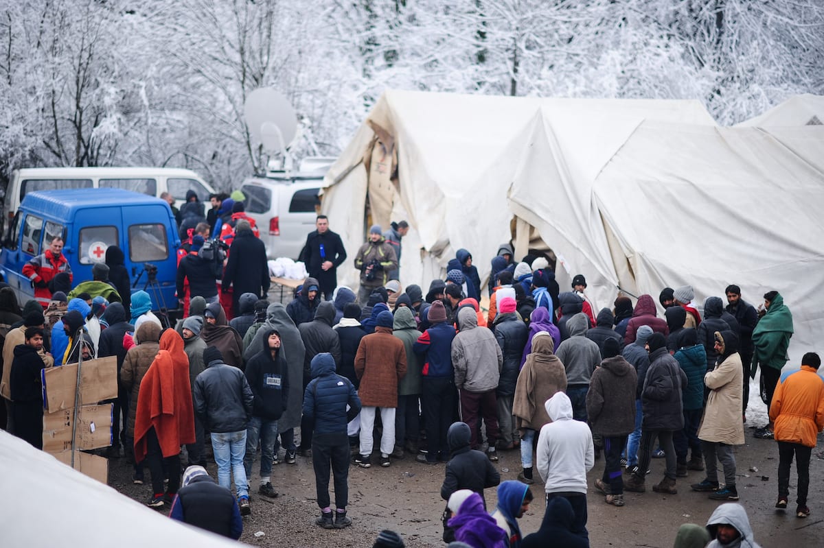Irregular migrants, who were not allowed to cross the Croatian border and living in the camp 'Vucjak' near Bihac, reject foods, distributed by charities, as a reaction, in Bihac in Bosnia and Herzegovina on 5 December 2019. [Mustafa Öztürk - Anadolu Agency]