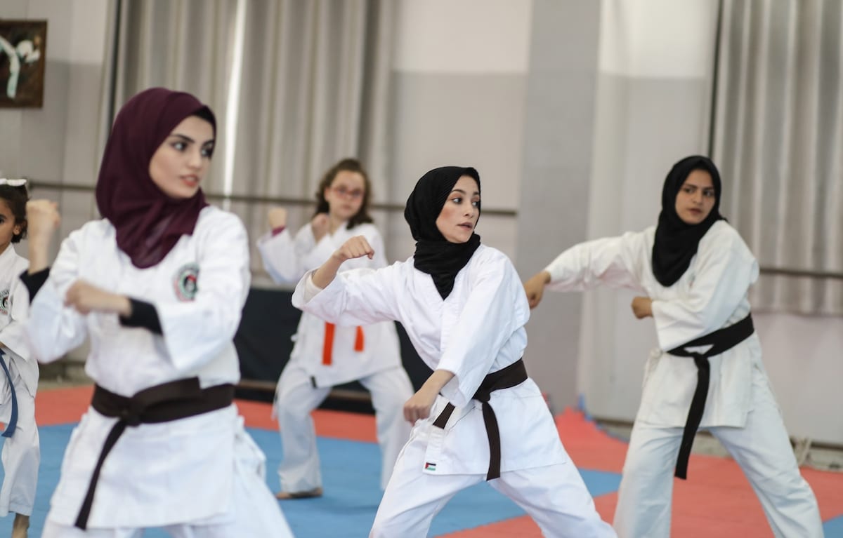 Female karate students take part in a training in Gaza City, Gaza on 2 December 2019. [Ali Jadallah - Anadolu Agency]