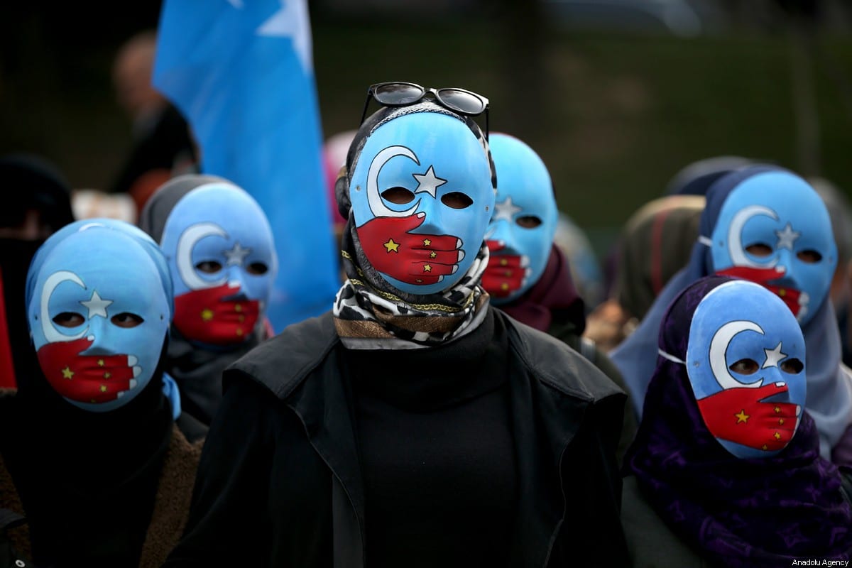 People gather to stage a demonstration in support of Uyghur Turks against human rights violations of China, at Orhangazi Park in Bursa, Turkey on December 20, 2019 [Ali Atmaca / Anadolu Agency]