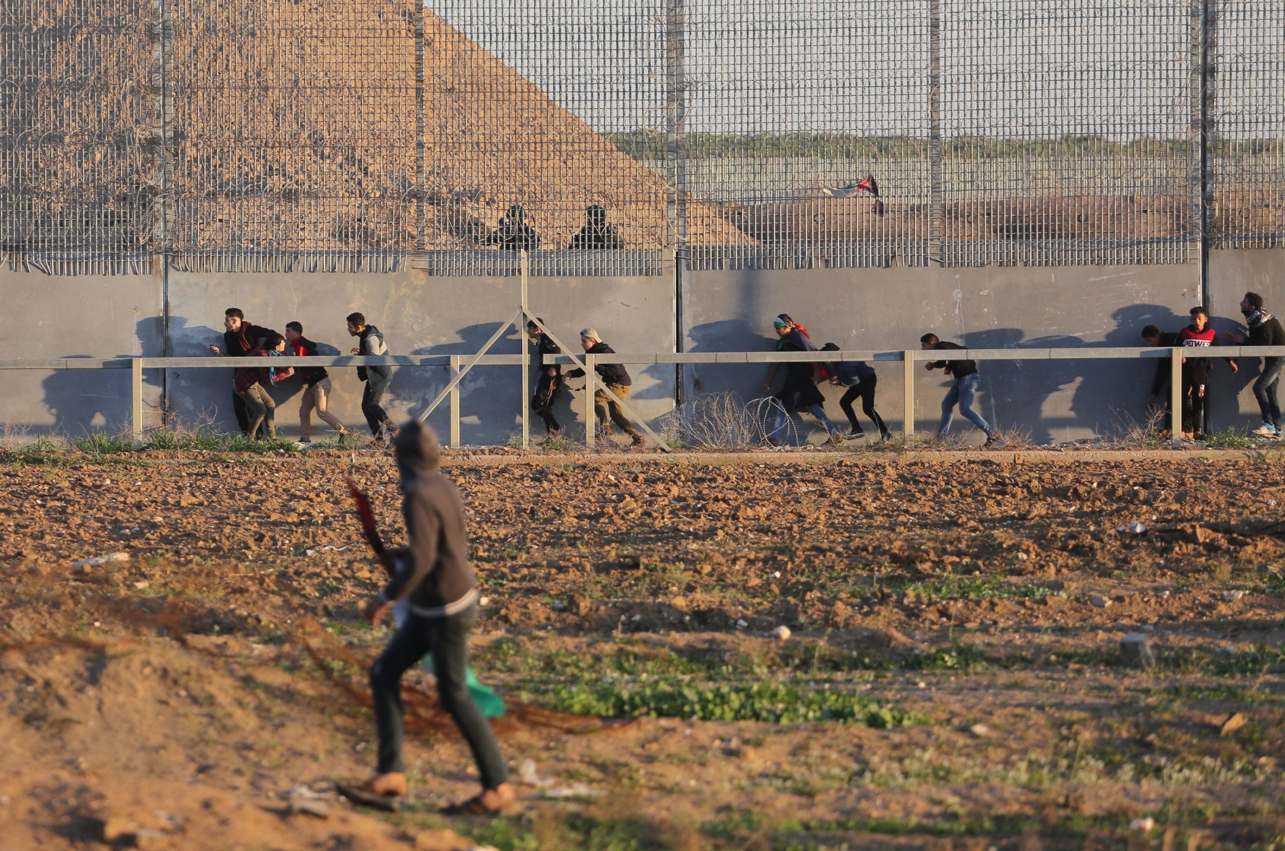 Palestinians gather at the Separation Fence as 'Great March of Return' demonstrations continue on Friday 20 December in Gaza [Mohammed Asad/Middle East Monitor]