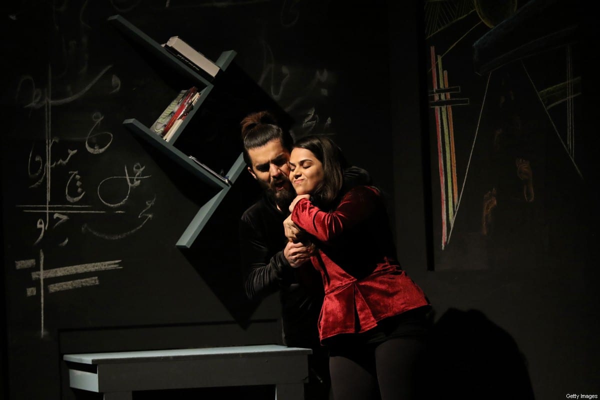 Iraqi Kurdish actors perform in "My ears are talking", a play directed by Kurdish Karukh Ibrahim denouncing the threat of the Islamic State (IS) to the Yazidi religious minority's women and girls, on 10 December, 2018, in Arbil, the capital of the autonomous Kurdish region of northern Iraq [SAFIN HAMED/AFP via Getty Images]