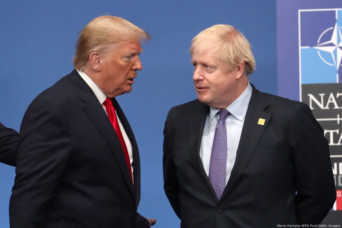 US President Donald Trump and British Prime Minister Boris Johnson onstage during the annual NATO heads of government summit on 4 December, 2019 [Steve Parsons-WPA Pool/Getty Images]