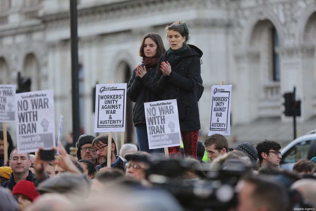 People take part in an anti-war rally following the killing of Iranian Revolutionary Guards' Quds Force commander Qasem Soleimani by a US airstrike in the Iraqi capital Baghdad, on January 04, 2020 at Downing Street in London, United Kingdom [İlyas Tayfun Salcı / Anadolu Agency]