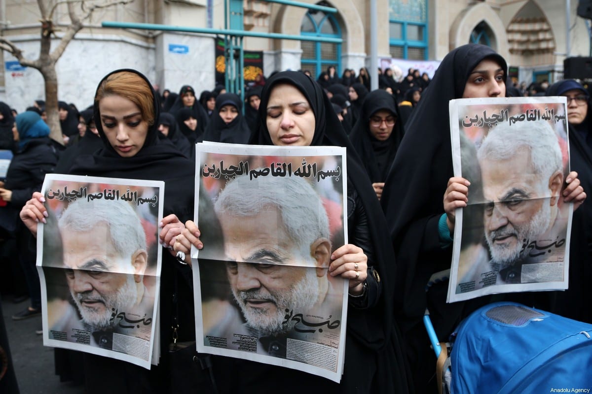 Iranian women carry images of Iranian Revolutionary Guards' Quds Force commander Qasem Soleimani, who was killed by a US airstrike in the Iraqi capital Baghdad, during an anti-US rally to protest the killing at Palestine Square in the capital Tehran, Iran on 4 January 2020. [Fatemeh Bahrami - Anadolu Agency]