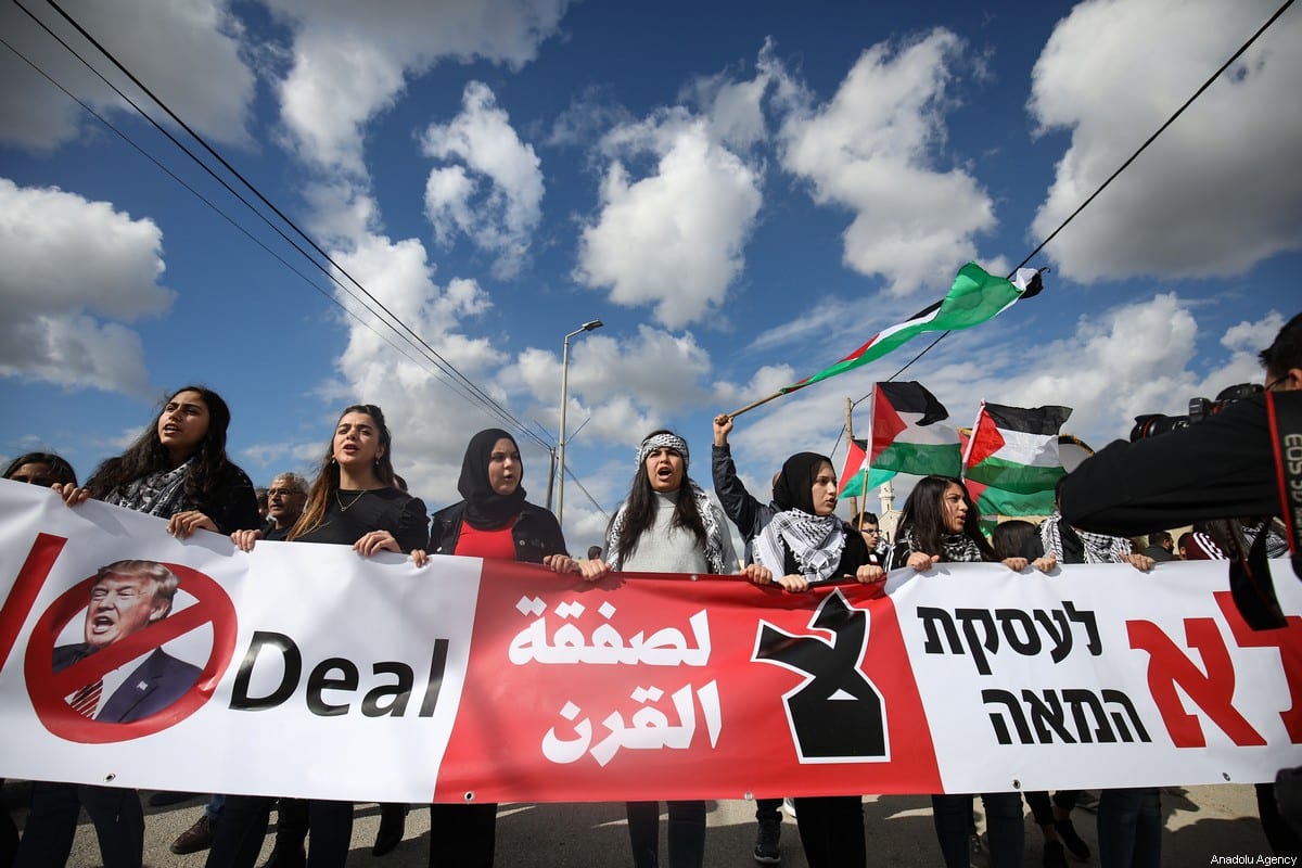 Palestinians protest against US President Donald Trump’s so-called Middle East peace plan on 1 February 2020 [Mostafa Alkharouf/Anadolu Agency]