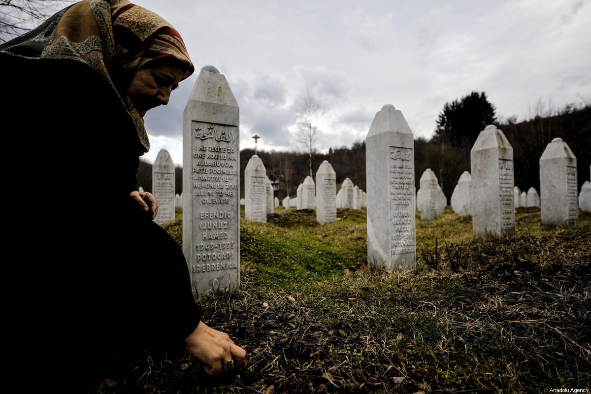 Mother of a Srebrenica victim Fazila Efendic visits graves of her husband and son who lost their lives in the genocide, which started on July 11, 1995 when soldiers under the command of Serbian commander Ratko Mladic took over the city of Srebrenica, at Potocari Memorial Cemetery in Srebrenica, Bosnia and Herzegovina on February 15, 2020. [Samır Jordamovıc - Anadolu Agency]