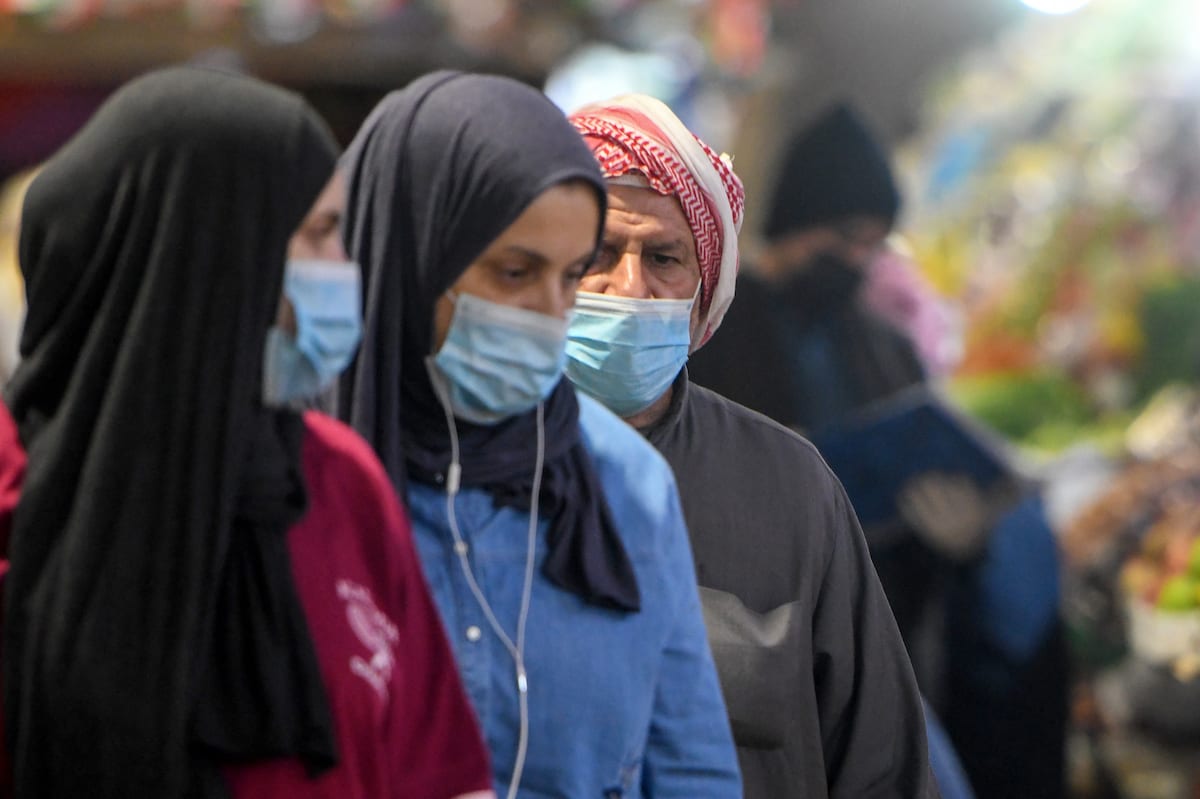 People wear medical masks as a precaution against coronavirus, officially known as COVID-19, on 26 February 2020 in Kuwait city, Kuwait. [Jaber Abdulkhaleg - Anadolu Agency]