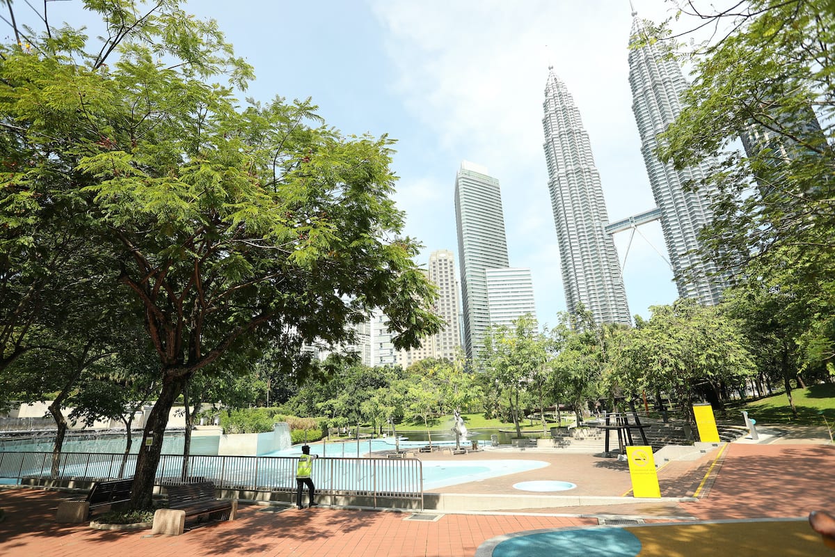 A view KLCC Twin Tower Neighbourhood is seen looks empty amid coronavirus fear in Kuala Lumpur, Malaysia on 17 March 2020. [Farid Bin Tajuddin - Anadolu Agency]