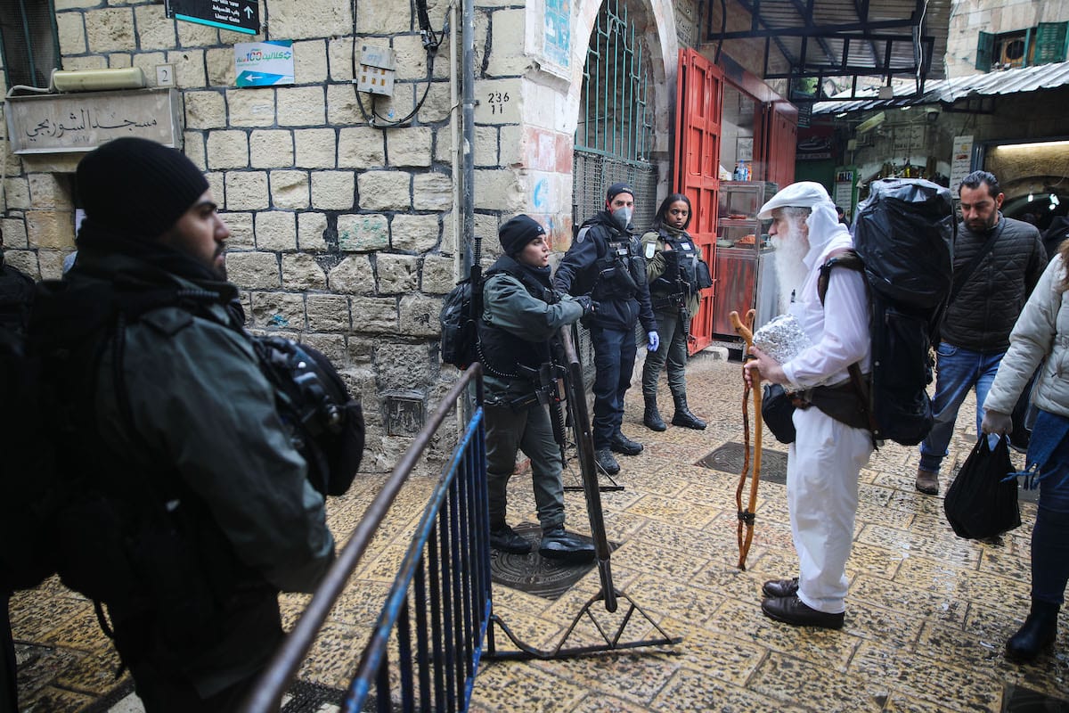 Israeli forces stand guard at checkpoints within the coronavirus (Covid-19) pandemic precautions ahead of the Friday Prayer in Jerusalem on 20 March 2020 [Mostafa Alkharouf/Anadolu Agency]