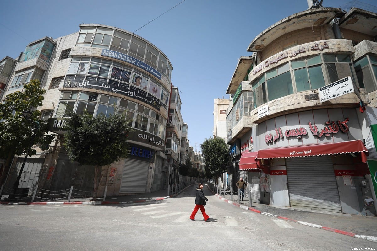 Empty streets and closed shops are seen after a curfew was announced by authorities as a measure against coronavirus (COVID-19), in Ramallah, West Bank on March 23, 2020 [Issam Rimawi / Anadolu Agency]