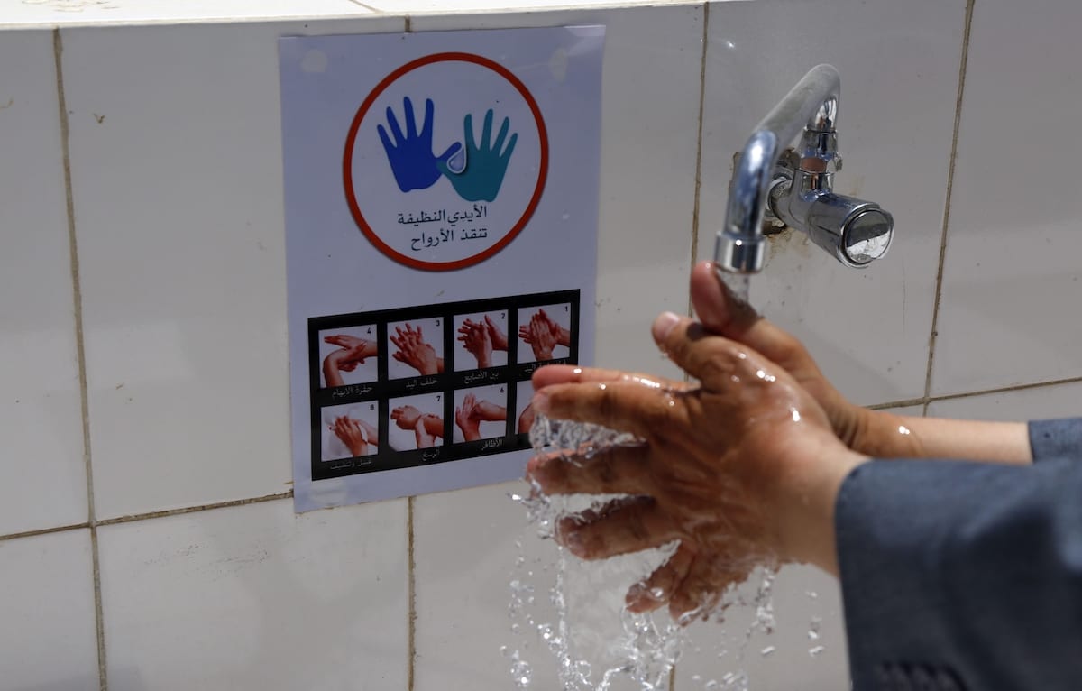 A person washes hands at the new department for coronavirus patients at Zaid Hospital in Sanaa, Yemen on 28 March 2020 [Mohammed Hamoud/Anadolu Agency]