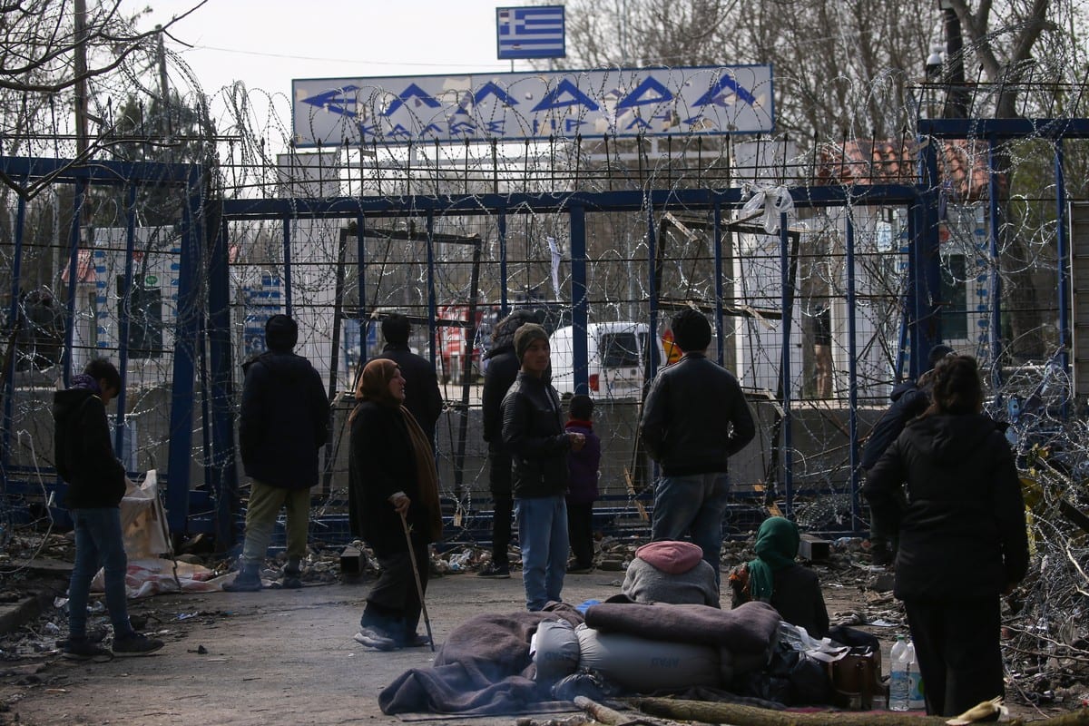 Asylum seekers continue to wait at woodland near buffer zone located between the Kastanies and the Pazarkule border gates, hoping that Greece will open the border gate, on March 18, 2020 [İslam Yakut/Anadolu Agency]
