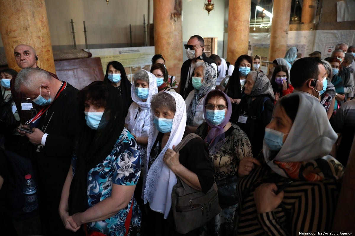 Palestinian citizens wear masks to protect themselves from coronavirus (COVID-19) at public places in Bethlehem, West Bank on 5 March, 2020 [Wisam Hashlamoun/Anadolu Agency]