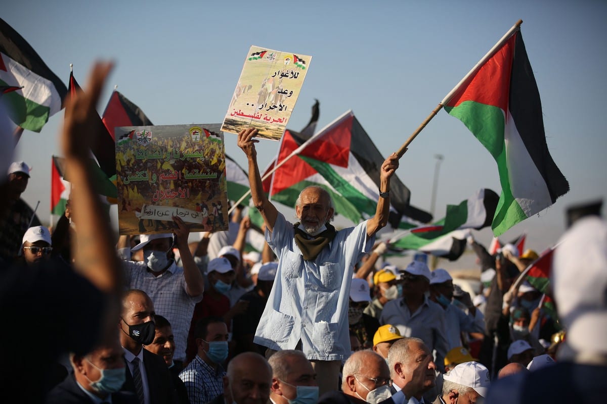 Palestinians gather to stage a protest against and Israel's annexation plans in the West Bank on 22 June 2020 [Issam Rimawi/Anadolu Agency]