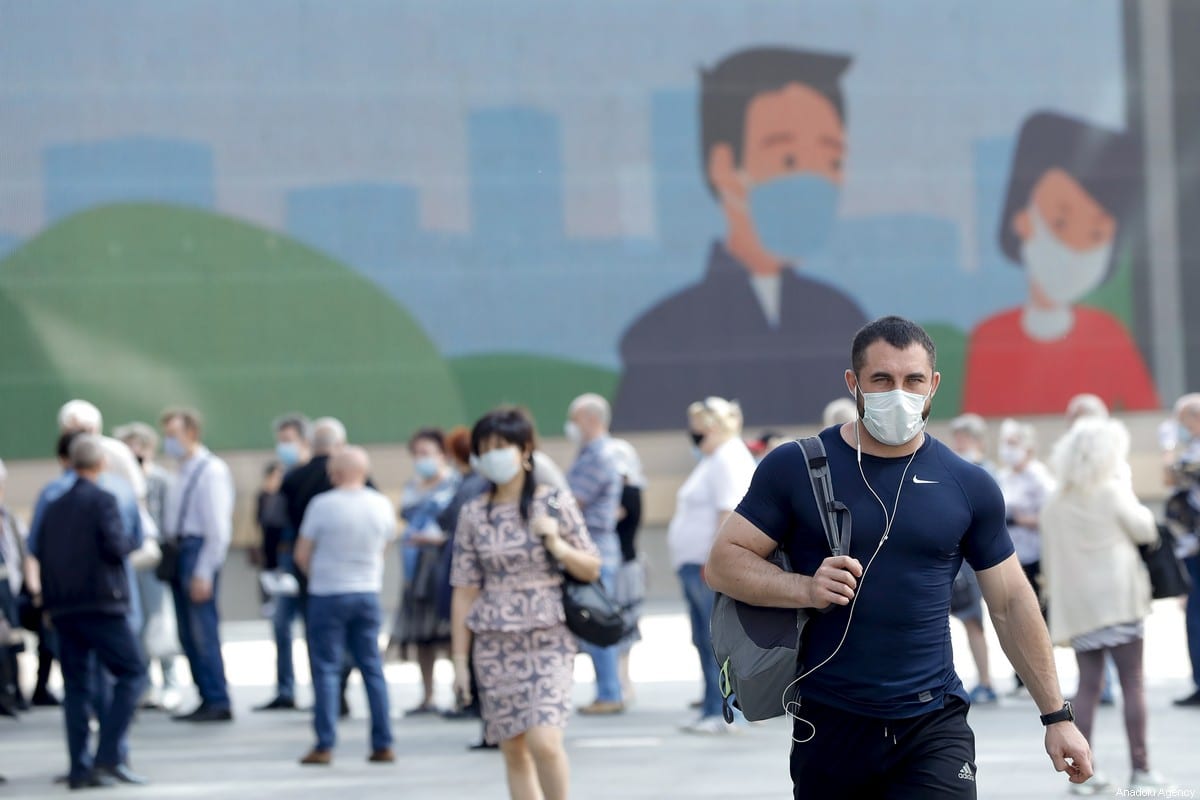 People wearing masks as a precaution against coronavirus (Covid-19) in Moscow, Russia on 9 June 2020 [Sefa Karacan/Anadolu Agency]