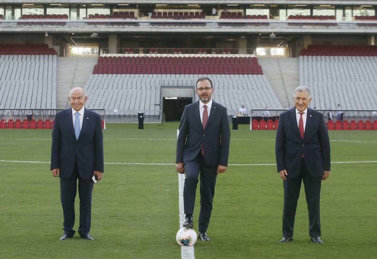 Turkish Minister of Youth and Sports, Mehmet Muharrem Kasapoglu (C) and Turkish Football Federation President Nihat Ozdemir (L) are seen at Ataturk Olympic Stadium before holding a meeting to evaluate UEFA Board of Directors’s decisions in Istanbul, Turkey on 17 June 2020. [Erhan Elaldı - Anadolu Agency]