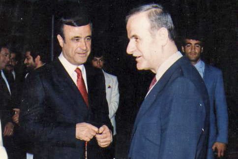 Rifaat and Hafez al-Assad [Wikipedia]