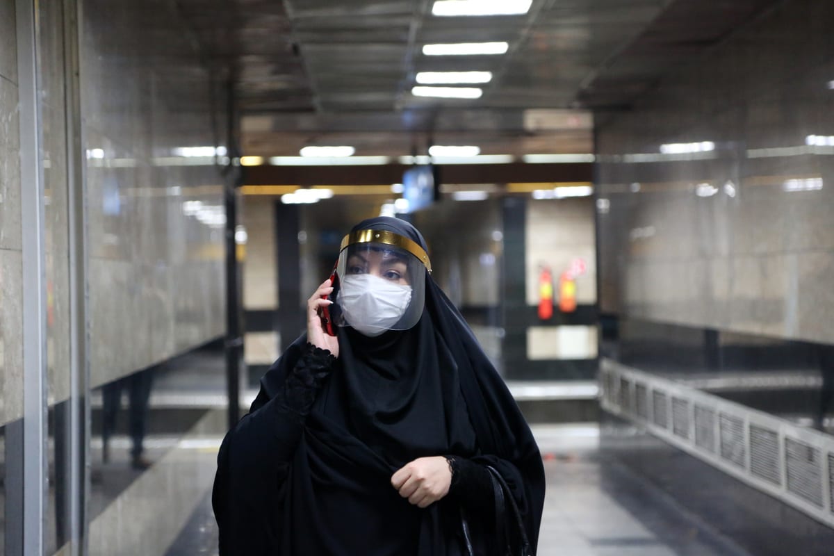 A woman wearing masks is seen at a subway after wearing face mask become mandatory in public transports in Tehran, Iran 15 June, 2020 [Fatemeh Bahrami/Anadolu Agency]