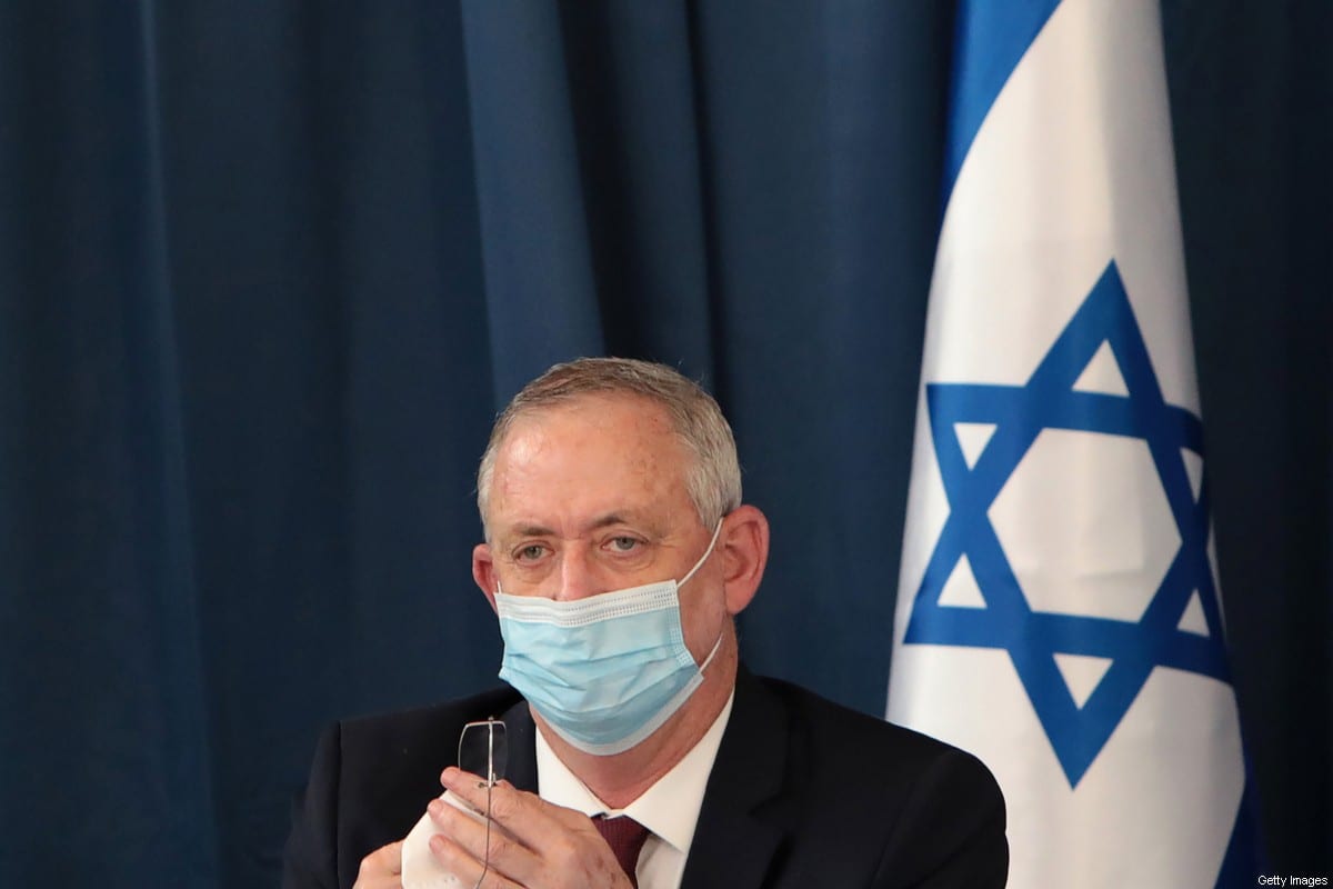 Israeli defence minister and alternate prime minister Benny Gantz wears a protective mask as he attends the weekly cabinet meeting at the foreign ministry in Jerusalem on July 5, 2020 [GALI TIBBON/POOL/AFP via Getty Images]