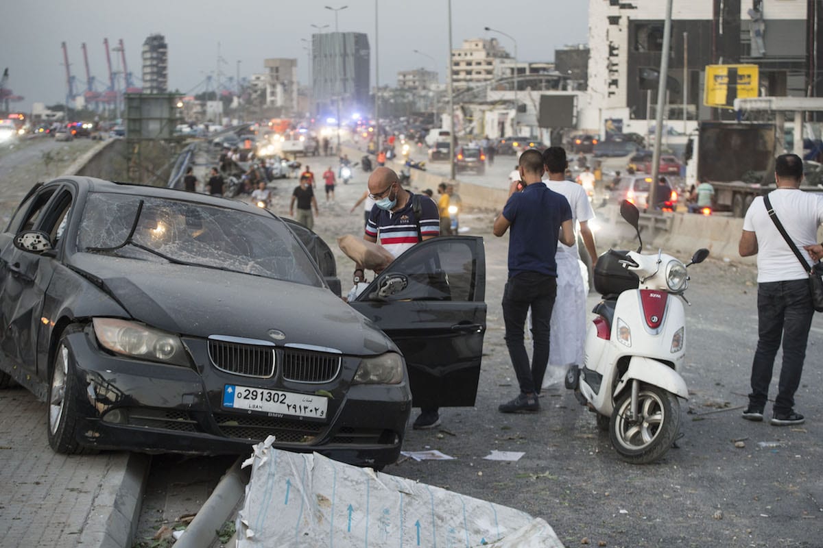 A damaged car is seen after a fire at a warehouse with explosives at the Port of Beirut led to massive blasts in Beirut, Lebanon on August 4, 2020 [Houssam Shbaro/Anadolu Agency]