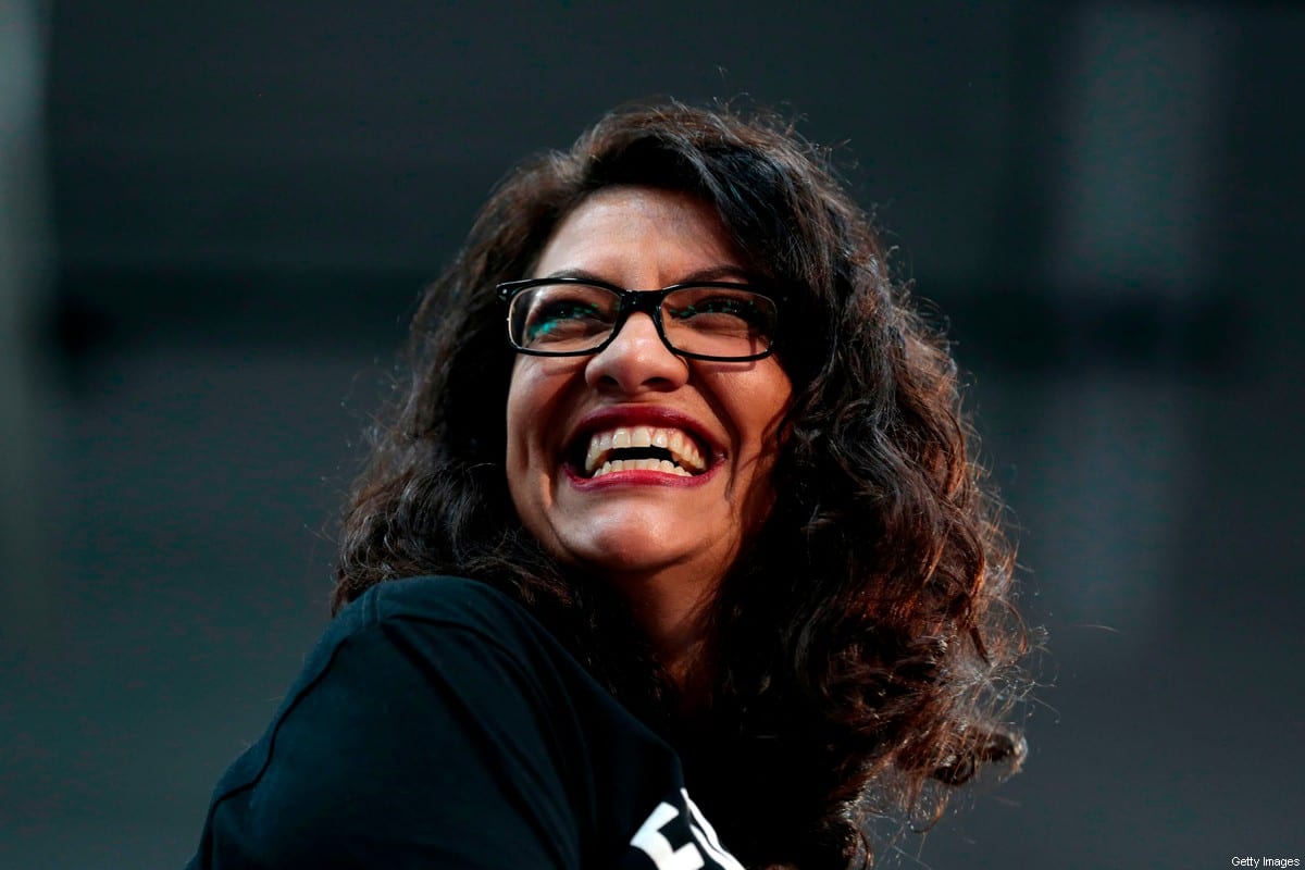 Representative Rashida Tlaib (D-MI) speaks as she endorses 2020 Democratic presidential hopeful US Senator Bernie Sanders (D-VT) during a campaign rally at Cass Technical High School in Detroit, Michigan, on October 27, 2019. [JEFF KOWALSKY/AFP via Getty Images]