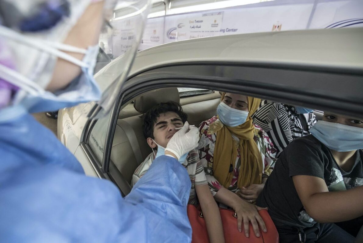 Egyptians get tested for Covid-19 at a drive-through coronavirus-testing centre in Cairo, Egypt on 29 June 2020 [KHALED DESOUKI/AFP/Getty Images]