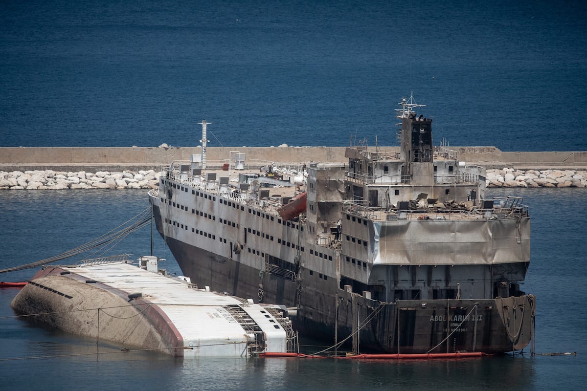Damaged ships are seen in the Beirut port following an explosion that killed over 200 people in Lebanon, 18 August 2020 [Chris McGrath/Getty Images]