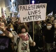 Demonstrators gather to stage a protest against Israeli Prime Minister Benjamin Netanyahu, demanding his resignation over corruption cases and his failure to combat the coronavirus pandemic in West Jerusalem on September 5, 2020 [Mostafa Alkharouf / Anadolu Agency]
