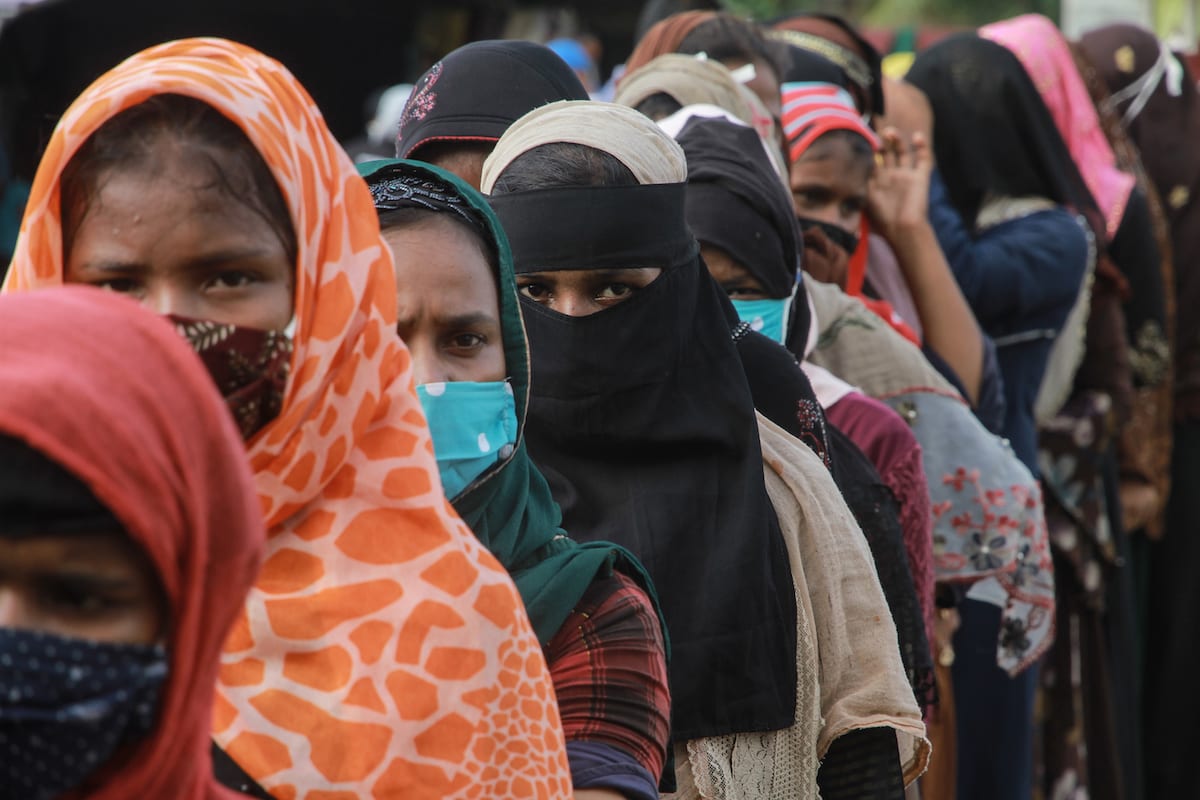 Rohingya refugee women queue for aid on 7 September 2020 [Khalis Surry/Anadolu Agency]