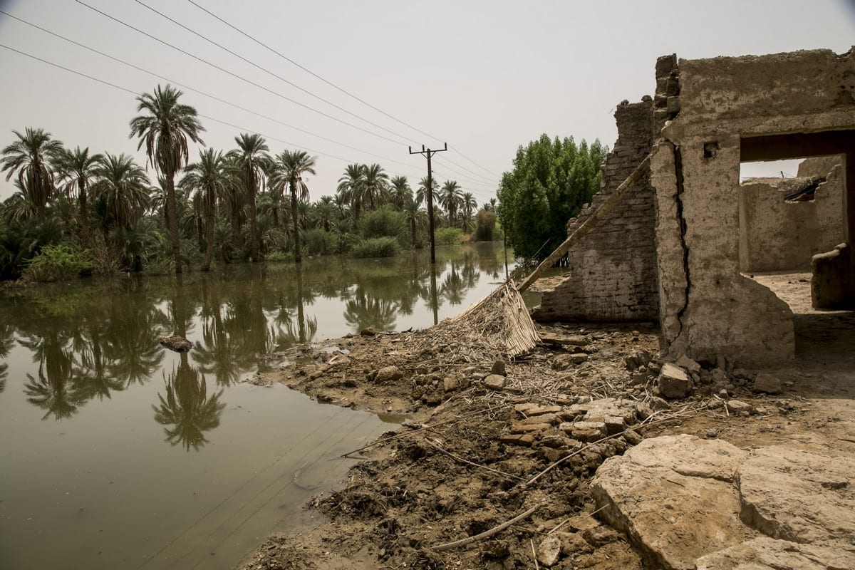 A general view of a destroyed building is seen near a submerged area after flash floods hit Merove town of Khartoum, Sudan on 13 September 2020. [Mahmoud Hjaj - Anadolu Agency]