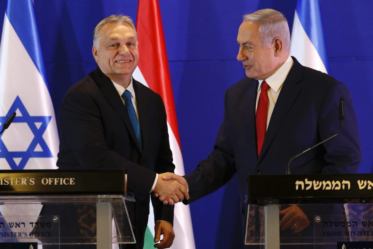Hungarian Prime Minister Viktor Orban (L) and Israeli Prime Minister Benjamin Netanyahu shake hands during a press conference after their meeting in Jerusalem on February 19, 2019 [ARIEL SCHALIT/AFP via Getty Images]