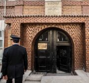 An Egyptian police officer enters the Tora prison in the Egyptian capital Cairo on 11 February 2020 [KHALED DESOUKI/AFP via Getty Images]