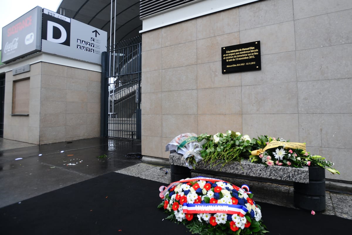 The commemorative plaque unveiled by French President Francois Hollande and Saint-Denis Mayor Didier Paillard is seen outside the Stade de France stadiumon the first anniversary of the 2015 Paris terrorists attacks on November 13, 2016 in Saint Denis, France. [Frederic Stevens/Getty Images]
