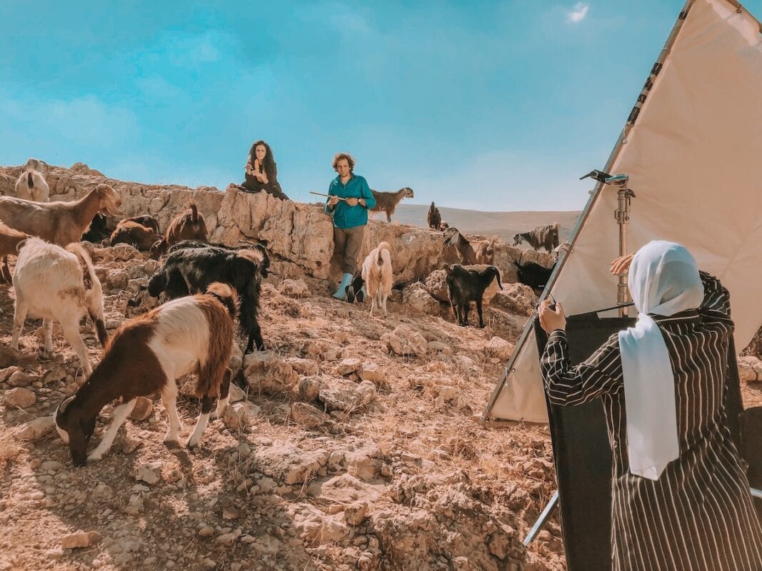 Behind the scenes: Director Rama with two main cast members.