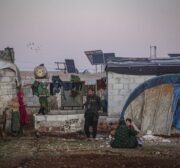 Displaced Syrians are seen near their makeshift tents in Idlib, Syria on 16 October 2020 [Muhammed Said/Anadolu Agency]