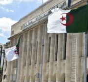 Algerian flags flutter in front of the People's National Assembly (parliament) building in the capital Algiers, on 10 September 2020. [RYAD KRAMDI/AFP via Getty Images]