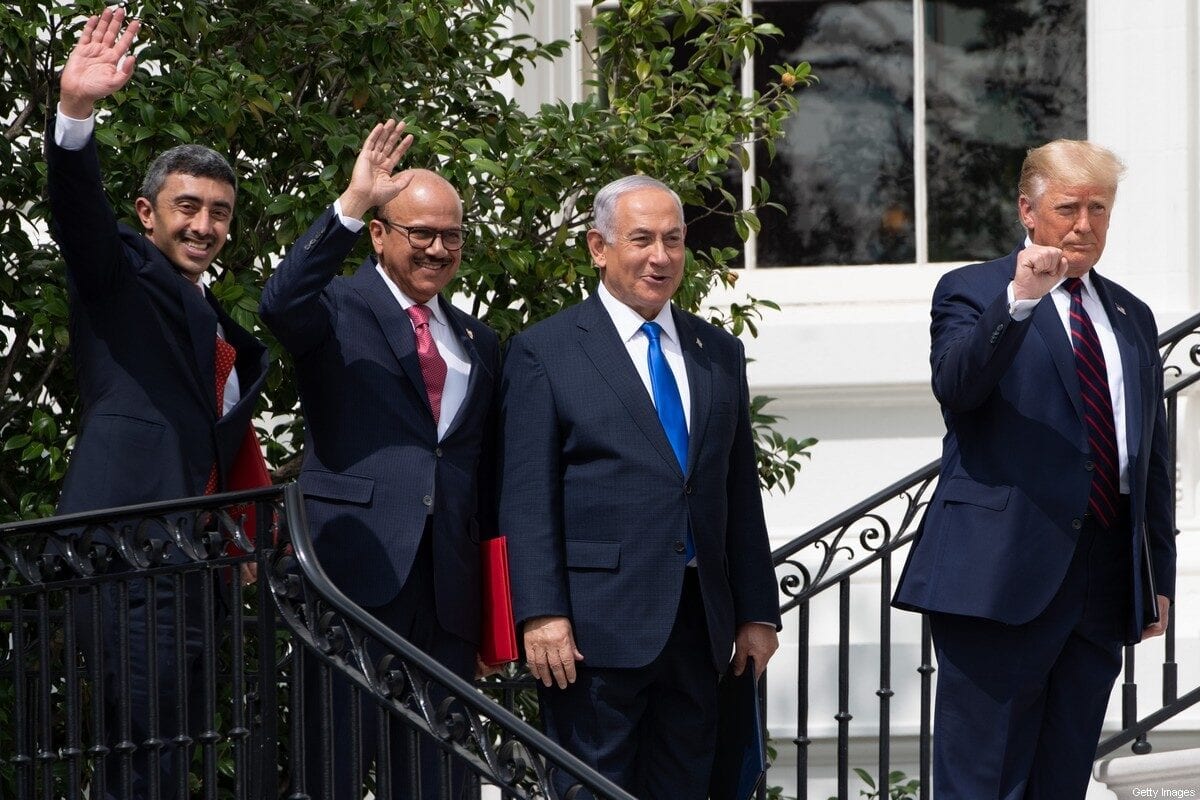(L-R)UAE Foreign Minister Abdullah bin Zayed Al-Nahyan, Bahrain Foreign Minister Abdullatif al-Zayani, Israeli Prime Minister Benjamin Netanyahu, and US President Donald Trump, wave on the South Lawn of the White House after they participated in the signing of the Abraham Accords where the countries of Bahrain and the United Arab Emirates recognize Israel, in Washington, DC, September 15, 2020. - Israeli Prime Minister Benjamin Netanyahu and the foreign ministers of Bahrain and the United Arab Emirates arrived September 15, 2020 at the White House to sign historic accords normalizing ties between the Jewish and Arab states. (Photo by SAUL LOEB / AFP) (Photo by SAUL LOEB/AFP via Getty Images)