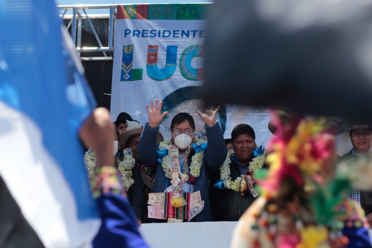 LA PAZ, BOLIVIA - OCTOBER 24: Newly elected president of Bolivia Luis Arce waves to supporters during a celebration being officially announced as new president of Bolivia on October 24, 2020 in La Paz, Bolivia. Luis Arce of MAS party was officially announced on October 23rd as Bolivia's new president after Supreme Electoral Tribunal informed final results, five days after general elections. Arce will rule the country for the next five years. (Photo by Gaston Brito/Getty Images)